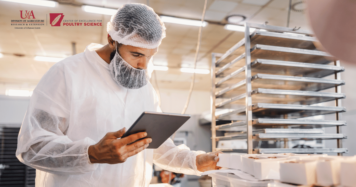 man in hairnet with clipboard